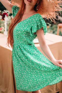 Our Green Ditsy V-Neck Flutter Sleeve Mini Dress features a lively pattern that’s perfect for any casual occasion. The flutter sleeves add a touch of whimsy, while the V-neckline offers a flattering look. This charming mini dress is ideal for spring picnics or sunny days out. Product code: CAA05A4D180PP Features:  Woven V-neckline Flutter sleeves Mini Pattern: Floral Wash Method: Regular Wash Material: 100%RAYON. Green Flutter Sleeve Summer Dress, Casual Dress With Butterfly Sleeves For Garden Party, Green Butterfly Sleeve Summer Dress, Green Butterfly Sleeve Dress For Spring, Green Spring Dresses With Butterfly Sleeves, Ditsy Floral Print Flutter Sleeve Dress For Garden Party, Ditsy Floral Print Flutter Sleeve Dress For Vacation, Ditsy Floral Print Dress With Flutter Sleeves For Vacation, Flutter Sleeve Dresses With Ditsy Floral Print For Vacation