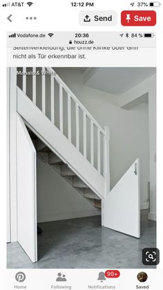 an instagramted photo of a white staircase in a room with gray flooring