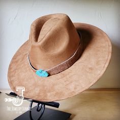 If you’re looking for the perfect accessory to complement your favorite boho style, look no further. The Boho-Style Western Felt Hat w/ Hair-on-Hide Leather Hat Band by The Jewelry Junkie is absolutely everything that you need. Not only is it easy to incorporate into any and all outfits, but the genuine leather of the band immediately elevates whatever it is you’re wearing. Match your one-of-a-kind hat with any one of the matching accessories that we have for a completely gorgeous look. One Size Hat with adjustable inner hat liner (see last photos) 1 inch wide Hat Band Hair-on-Hide Leather Hide Genuine Leather Band is Sourced and Hand-Made in Texas Genuine Howlite Turquoise stone is hand-sewn to leather Stone will range in size from 1/2"-1" Boho Style Western Felt Hat-choice of color Wide Wide Hat, Western Hat, Band Hair, Boho Hat, Leather Hat, Medium Handbags, Packing Jewelry, Leather Hats, Leather Hide