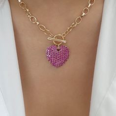 Material: gold plated brass, crystals Length: 18" Heart Pendant size: 1" x 1" IMPORTED Pink Heart-shaped Jewelry With Clavicle Chain, Pink Heart-shaped Clavicle Chain Jewelry, Pink Heart Pendant Necklace With Clavicle Chain, Pink Heart Necklace On Clavicle Chain, Pink Heart Necklace With Clavicle Chain For Valentine's Day, Valentine's Day Pink Heart Necklace With Clavicle Chain, Pink Heart Pendant Jewelry With Adjustable Chain, Pink Heart Shaped Necklace With Adjustable Chain, Pink Heart Pendant Clavicle Necklace