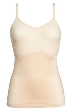 Create a smooth look under everyday outfits with this lightweight, breathable shaping cami that wraps around your body and targets your tummy and sides. The stretchy, single-layer fabric smoothes out any lumps or bumps, and the noncompression bust offers a squish-free fit. Scoop neck Adjustable straps 77% nylon, 23% elastane body; 55% nylon, 45% Lycra® elastane bust Machine wash, tumble dry Imported Supportive Shapewear Tank Top With Built-in Bra, Seamless Camisole Shapewear, Summer Shapewear Camisole, Shapewear Camisole With Seamless Construction, Seamless Shapewear Tank Camisole, Shaping Seamless Camisole, Seamless Tank Shapewear Camisole, Shaping Seamless Cami Top, Supportive Shapewear Tank Top With Medium Bust Support