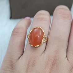 This Ring comes with a 100% Natural Carnelian Gemstone and it is made up of 925 solid sterling silver. This ring is handcrafted by our skilled craftsmen and designed by us. Every gemstone is handpicked for the best quality. Materials:- Silver (925 Solid Sterling Silver) Gemstone:- Natural Carnelian. Item Weight :- approx. 4 Grams Stone Weight :- 10 CTS Stone Size :- 12x16 MM Stone Shape :-  Oval Cab Select Size in Variation , if you don't find perfect size please buy any size and message us your Middle Finger Ring, Carnelian Ring, Wedding Bridal Jewellery, Ring Finger, Cocktail Ring, Ring Gift, Wedding Rings Engagement, Silver 925, Wedding Jewelry