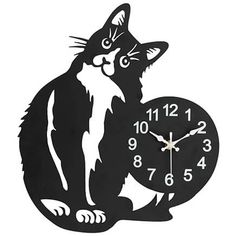 a black and white clock with a cat sitting on it's side, showing the time