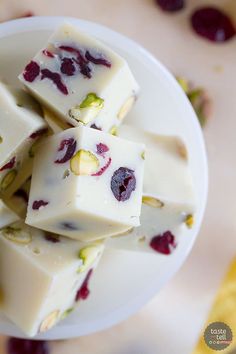 white chocolate with cranberries and pistachio on top