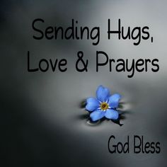 a blue flower with the words sending hugs, love and prayers god bless