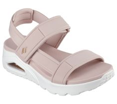 Heat up the season with style in Skechers Uno - Summer Stand2. This vegan T-strap sandal inspired from our iconic Uno silhouette features a debossed nylon upper with an adjustable slingback strap. This design is complete with a cushioned Yoga Foam footbed and a visible Skech-Air airbag midsole. | Skechers Women's Uno - Summer Stand2 Sandals | Medium Width | Skech-Air visible airbag midsole | Yoga Foam cushioned comfort footbed | Crafted with 100% vegan materials | Embossed nylon upper with adjus Trendy Synthetic Sandals With Adjustable Strap, Summer Sport Sandals With Heel Strap And Synthetic Material, Summer Sport Sandals With Straps In Synthetic Material, Summer Sport Sandals With Strap, Synthetic, Summer Synthetic Sport Sandals With Strap, Spring Synthetic Sport Sandals With Strap, Trendy Synthetic Sandals With Arch Support, Adjustable Synthetic Sport Sandals For Spring, Synthetic Sport Sandals With Double Strap And Heel Strap