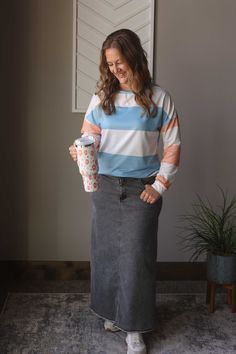 Introducing your new go-to denim skirt! The Dark Grey Denim Back Slit Maxi Skirt is trendy and versatile for everyday wear. Its back slit detail adds movement and comfort to any outfit. A must-have for home, work, or the classroom. Trendy Modest Outfits