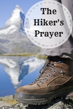 the hiker's prayer is written in front of a lake and mountain range