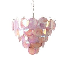 a pink chandelier hanging from a chain