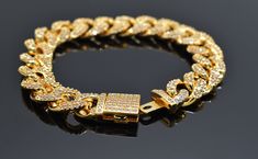 "*Size : 16.5cm (6.5\") long, 10mm wide *Color : 16K shiny gold plating , Crystal *Material : Brass, Cubic zirconia *0.2 MICRON PLATING (JTD40)" Iced Out Gold Bracelet For Formal Occasions, Formal Gold Iced-out Chain Bracelet, Gold Cuban Link Bracelet With Bling, Gold Iced Out Diamond Bracelet For Formal Occasions, Gold Iced Out Bracelets For Formal Occasions, Formal Gold Iced Out Bracelets, Gold Iced Out Cuban Link Bracelet Gift, Gold Cuban Link Bracelet With Cubic Zirconia, Luxury Gold Bracelets With Bling