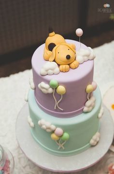 a winnie the pooh cake on a table