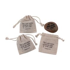 three small bags filled with different types of bibles and sayings on the side