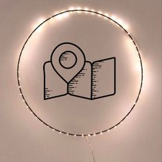 a circular sign with a map on it and some lights around the edge that are lit up