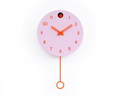 a pink clock with orange hands on a white background