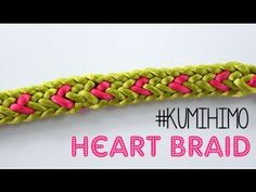 a close up of a pink and green braid on a white background with the words ku mito heart braid