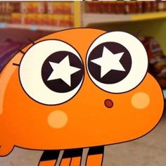 an orange cartoon character with big eyes and stars on it's face, looking at the camera