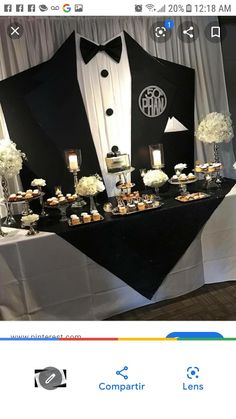 an image of a tuxedo themed dessert table