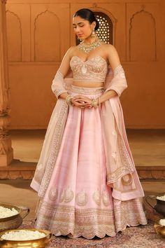 Blush pink raw silk lehenga with an attached cancan and kashmiri tilla and basra moti embroidery. Comes with a padded blouse and a silk organza dupatta. - Aza Fashions Elegant Pink Chanderi Choli, Pink Silk Traditional Wear For Reception, Elegant Pink Silk Choli, Designer Wear Pink Tissue Silk Choli, Pink Silk Set With Unstitched Blouse, Pink Silk Sets With Unstitched Blouse, Elegant Pink Dola Silk Choli, Pink Tussar Silk Sets For Festivals, Semi-stitched Tussar Silk Set For Wedding