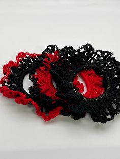 🎀Our 3 pieces of red and black hair ties are gentle. They don't slide or come off, and you'll see that your ponytail remains in place the whole day minus the creasing a traditional scrunchie would provide. Dividend and softer material, fine texture, glossy and relaxing, stretchable and elastic. A more attractive look for all the girls and a creek of happiness for everyone. The best part is these hair ties won't damage your hair. Suitable for thick hair. 🎀These crochet ponytail holders are excellent hair supplements for buns, messy buns, ponytails, plaits, or pigtails. Each hair tie includes long-lasting elastic bands, smooth and comfortable to wear and fix your hair firmly. It is effortless to extract it without harming your hair. Long-lasting enough to be utilized for a long time. These Black Hair Ties, Scrunchies Crochet, Crochet Ponytail, Hair Supplements, Messy Buns, Hair Scrunchies, Ponytail Holder, Hair Long, Plaits