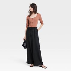 These High-Rise Wide-Leg Linen Pull-On Pants from A New Day™ make a great pick for warm-weather wear. Fashioned in comfortable wide-leg silhouette, they bring relaxed style to your look. The functional drawstring on the pull-on waist lets you get the perfect fit with every wear, and the functional pockets provide space for on-the-go essentials. A New Day™: Style that goes wherever you do. Brown Linen Pants, Linen Drawstring Pants, Name Canvas, Olive Green Pants, Stretch Dress Pants, Wide Leg Dress Pants, Cute Pants, Weather Wear, Wide Leg Linen Pants