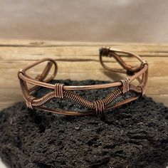 Handcrafted bracelet made with pure copper. Twisted by hand and shaped to fit your wrist. Hand Wrapped Copper Cuff Bracelet Gift, Adjustable Unique Rose Gold Bracelets, Unique Adjustable Rose Gold Bracelet, Adjustable Unique Rose Gold Bracelet, Artisan Electroformed Bangle Bracelets, Handmade Rose Gold Copper Cuff Bracelet, Spiritual Copper Cuff Bracelet As Gift, Spiritual Copper Cuff Bracelet For Gift, Bohemian Rose Gold Bangle Bracelets