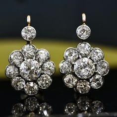 4.80 TCW Round Old European Cut Colorless Moissanite Diamond Earrings, Bezel Halo Designer Drop Earrings, Leverback Antique Diamond Earrings ✹✹𝐖𝐞𝐥𝐜𝐨𝐦𝐞 𝐭𝐨 𝐂𝐫𝐚𝐳𝐲𝐃𝐢𝐚𝐦𝐨𝐧𝐝𝐬𝐂𝐨✹✹ Detail about stones Moissanite : ----------------------------- Stone Shape: Round Old European Cut  Stone Size: 6 mm & 3.50 mm  Weight: 4.80 TCW  Color: Colorless Cut: Excellent Clarity: VVS ★ 𝑰𝒕𝒆𝒎 𝑫𝒆𝒕𝒂𝒊𝒍𝒔:- ☛ Metal Purity: Solid Gold (10KT, 14KT, 18KT); Silver(925 Sterling, 935 Argentium), 950 Platinum ☛ Metal Tone: Yellow, White, Rose ☛ Stamp/Hallmark: Yes ★ 𝑪𝒖𝒔𝒕𝒐𝒎𝒊𝒛𝒂𝒕𝒊𝒐𝒏:- ☛ Customized Design Jewelry. ☛ All cuts which you dream to make with moissanite. ☛ Updating every step of your ordered jewelry(Loose Stone, CAD & Making Process) ☛ All listed items in our stores are ma Luxury Antique Earrings In Diamond White, Classic Rose Cut Diamond Bridal Earrings For Anniversary, Classic Bridal Earrings With Rose Cut Diamonds For Anniversary, Silver Bezel Set Wedding Earrings, Silver Wedding Earrings With Bezel Setting, Silver Bezel Set Earrings For Wedding, Antique Diamond Earrings, Vintage Diamond Earrings, Diamond Chandelier Earrings