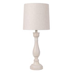 a white table lamp with a linen shade on it's base and an off - white lampshade