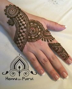 henna on the palm of a woman's hand