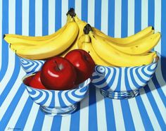 two bowls with apples and bananas in them on a blue and white striped tablecloth