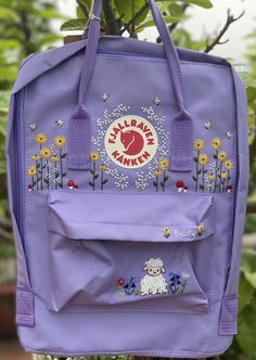 Welcome to my store and choose the perfect hand-embroidered fjallraven kanken backpack   Version & Size + Medium size: 38x27x13cm  + Big size: 42x32x13cm  - Product price includes: hand-embroidered fjallraven kanken backpack and design as shown in the picture - I can make fjallraven kanken backpack hand embroidery patterns according to your ideas - fjallraven kanken backpack will be hand embroidered with thread that won't fade when washed - fjallraven kanken backpack has a small front compartmen Fjallraven Kanken Pattern, Fjallraven Kanken Backpack Disney, Fjallraven Kanken Dahlia, Fjallraven Embroidery, Pink Kanken, Kanken Embroidery, Embroidery Design Flowers, Cute Converse, Embroidered Backpack