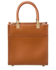 About The Brand: Innovative And Elegant Italian Luxury. Made In Italy Sunshine Mini Leather Tote In Brown Leather With Gold-Tone Hardware And Tubular Top Handles Interior Design Details: Fabric Lining Measures 5In Wide X 6.5In High X 2.5In Deep Top Handles Drop 3In Removable Shoulder Strap Drops 23In Open Top Please Note: All Measurements Were Taken By Hand And Are Approximate; Slight Variations May Occur. Our Products Are 100% Genuine. In Some Cases We Purchase Merchandise From Trusted Independ Fendi Sunshine, Prada Crossbody, Prada Crossbody Bag, Mini Tote, Italian Luxury, Elegant Accessories, Open Top, Chanel Handbags, Womens Tote Bags