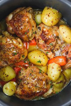 chicken, potatoes and carrots in a slow cooker