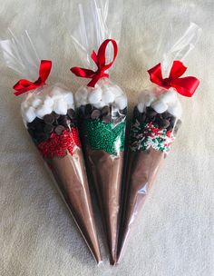 three cones filled with chocolate and marshmallows