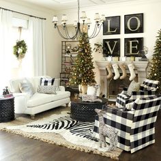 a living room filled with furniture and christmas decorations