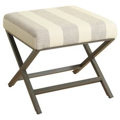 a small stool with a striped seat cover on it's back and metal legs