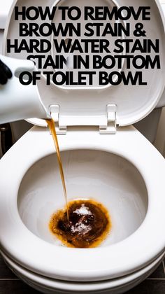 a white toilet bowl filled with brown liquid and sauce being poured into it's tank