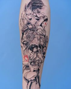 an arm with some anime characters on it