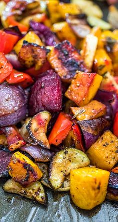 a white plate topped with potatoes and peppers