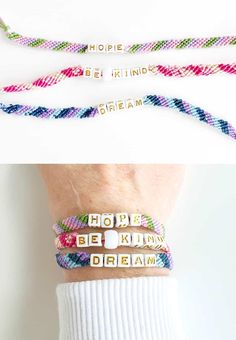 three different bracelets with words on them, one saying hope and the other saying dream