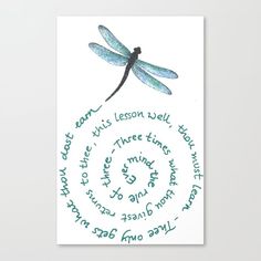 a blue dragonfly sitting on top of a white paper with words written in it