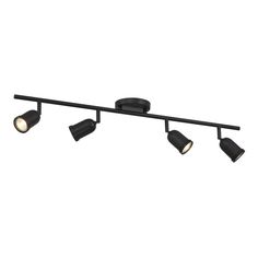 three spotlights are on the ceiling in this black track light fixture with dim lighting