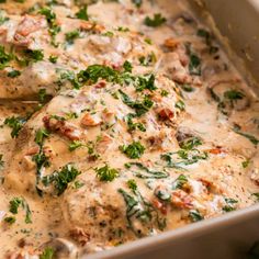 a casserole dish with meat covered in sauce