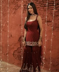 Punjabi Sangeet Outfit, Diwali Outfit Designs, Diwali Sharara Outfits, Masquerade Outfit Ideas Casual, Red Fitted Traditional Sharara, Fitted Red Traditional Sharara, Festive Traditional Brown Sharara, Sonam Bajwa Suits, Wine Colour Sharara Suit