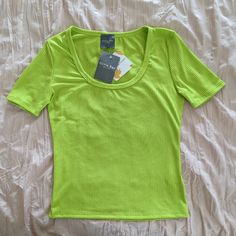 Oliva Rae New York Beautiful Lime Green Top With A Rigid Textured Design. Soft And Fun. Chest: 31 Inches Before Stretching. Green Basic Short Sleeve Top For Summer, Basic Green Short Sleeve Top For Summer, Basic Green Short Sleeve Top For Spring, Green Basic Scoop Neck T-shirt, Green Scoop Neck Basic T-shirt, Basic Green Scoop Neck T-shirt, Green Scoop Neck Top For Summer, Green Scoop Neck T-shirt For Summer, Green Scoop Neck T-shirt