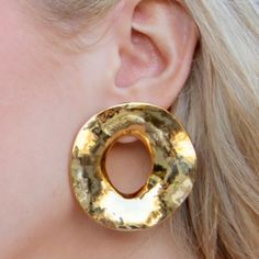 This fabulous elevated basic earring by Accessory Concierge is perfect for dinner out or to dress up any look. Hammered gold plated stainless steel. Measure about 2" long and 2" wide. Gold Hammered Hoop Earrings For Formal Occasions, Formal Gold Hammered Hoop Earrings, Chic Hammered Metal Earrings, Chic Gold Hammered Earrings, Modern Gold Plug Earrings For Party, Gold Metal Plug Earrings, Gold Modern Plug Earrings For Party, Chic Gold Hammered Hoop Earrings, Hammered Yellow Gold Earrings For Party