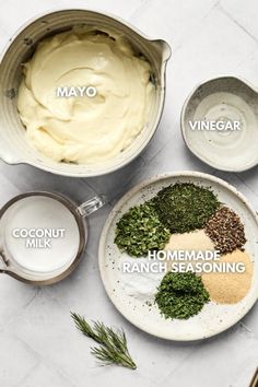 ingredients for homemade ranch seasoning laid out on a white counter top, with the words mayo and vinegar