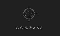 compass logo on black and white background