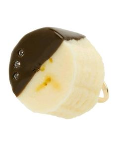 a banana and chocolate ice cream ring on a white background, with three diamonds in the middle