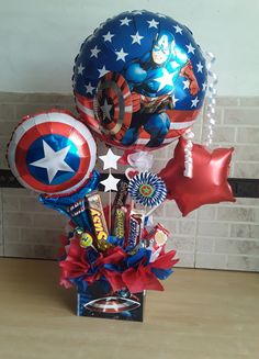 some balloons are in the shape of captain america and other things to put on them