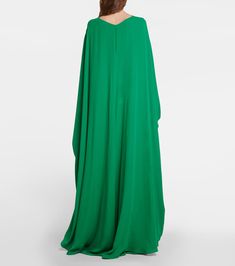 Caped Cady Couture Gown in Green - Valentino | Mytheresa Formal Long Sleeve Pre-draped Maxi Dress, Green Pre-draped Maxi Evening Dress, Pre-draped Long Sleeve Wedding Gown, Elegant Abaya With Cape Sleeves For Evening, Elegant Evening Abaya With Cape Sleeves, Green Pre-draped Evening Gown, Luxury Long Sleeve Silk Gown, Formal Gown With Draped Long Sleeves, Elegant Green Draped Gown